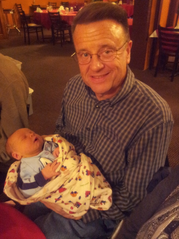 Holding Grandson